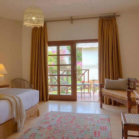 Neptune Village Beach Resort & Spa Galu Ngoại thất bức ảnh