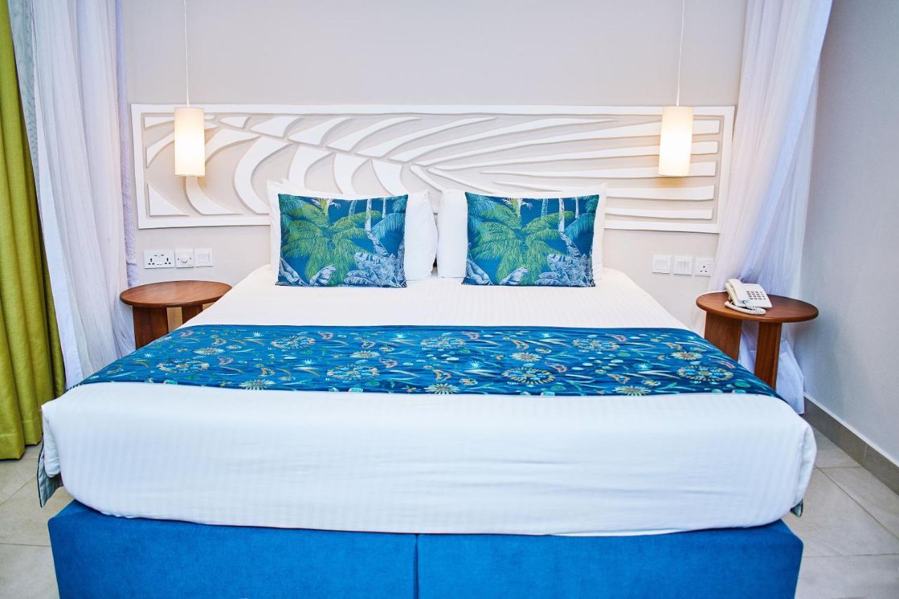 Neptune Village Beach Resort & Spa Galu Ngoại thất bức ảnh