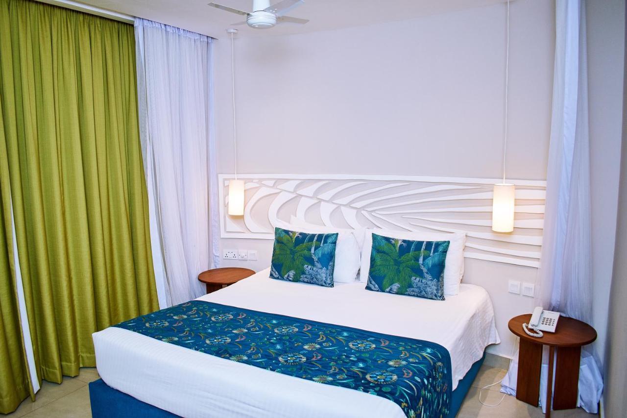 Neptune Village Beach Resort & Spa Galu Ngoại thất bức ảnh