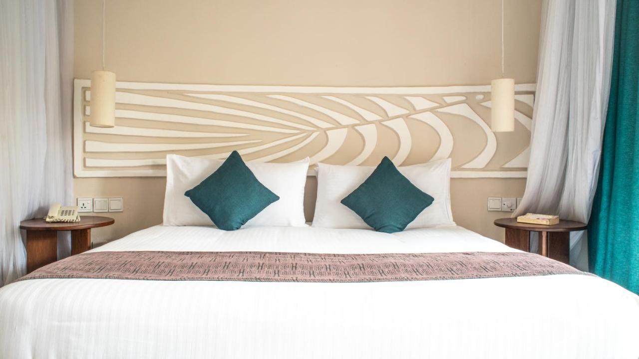 Neptune Village Beach Resort & Spa Galu Ngoại thất bức ảnh